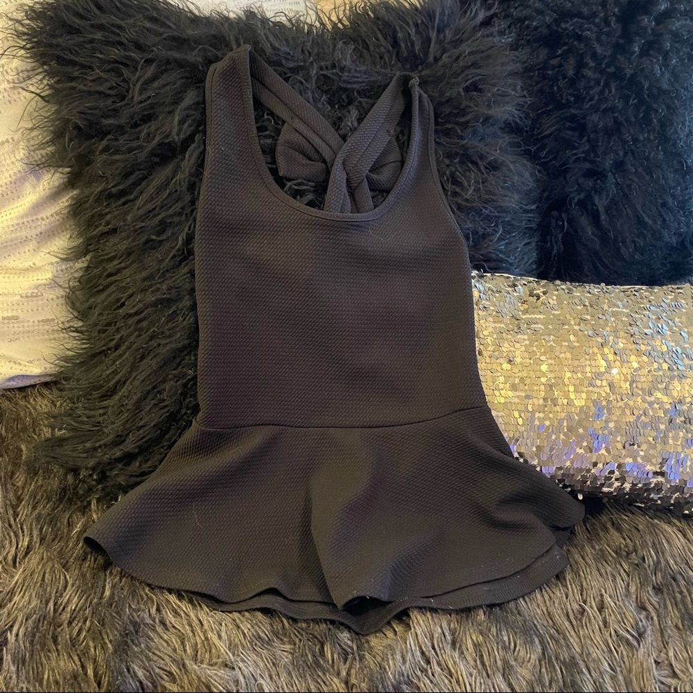 Dressy black peplum top with bow!